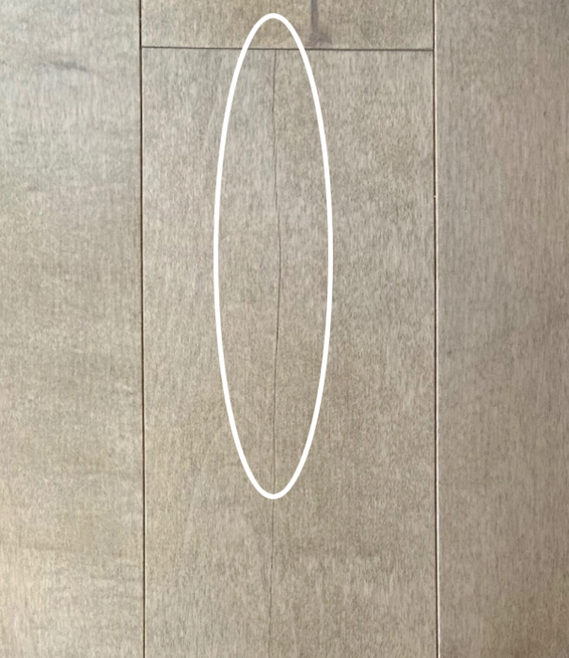fine crack on a floorboard